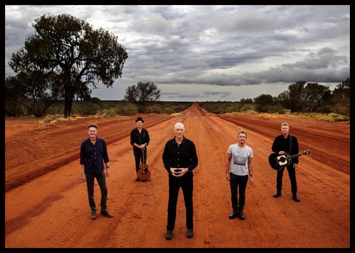 Midnight Oil Postpone Shows After Drummer Tests Positive For Covid-19