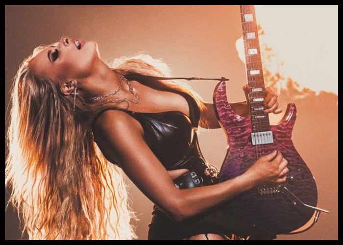 Machine Gun Kelly Guitarist Sophie Lloyd Denies ‘Disrespectful’ Cheating Rumors